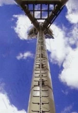 Floodlight mast for stadium lighting with galvanised steel ladder