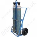 For the easy movement of two gas cylinders, over long distances and over rough terrain.