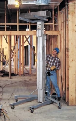 Genie SLC in use Raising Square Box Section Ducting